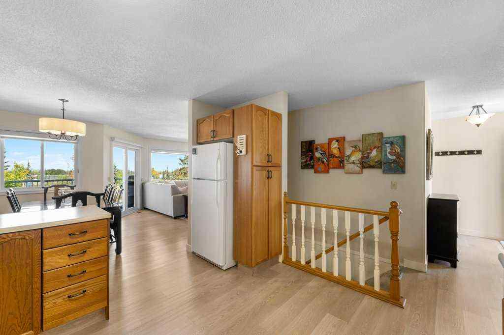 MLS® A2255899 - 83 Macewan Park Heights NW in MacEwan Glen Calgary, Residential