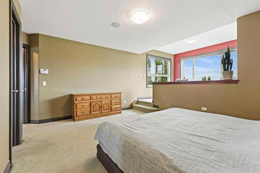 MLS® A2255901 - 66 Crestbrook Hill SW in Crestmont Calgary, Residential