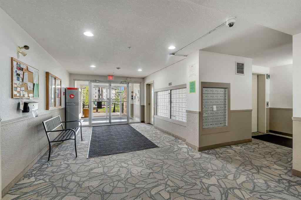MLS® A2255909 - Unit #8328 304 Mackenzie Way SW in Downtown Airdrie, Residential