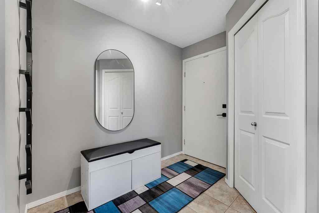MLS® A2255909 - Unit #8328 304 Mackenzie Way SW in Downtown Airdrie, Residential
