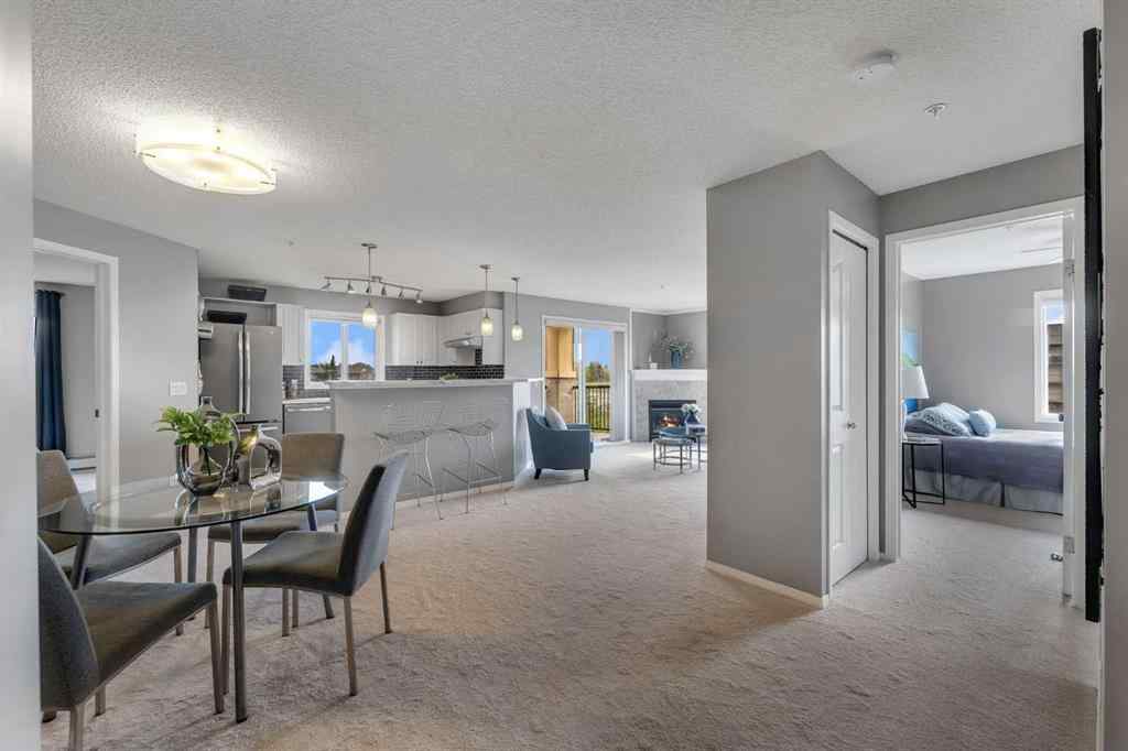 MLS® A2255909 - Unit #8328 304 Mackenzie Way SW in Downtown Airdrie, Residential