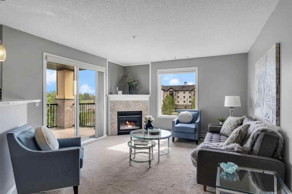 MLS® A2255909 - Unit #8328 304 Mackenzie Way SW in Downtown Airdrie, Residential