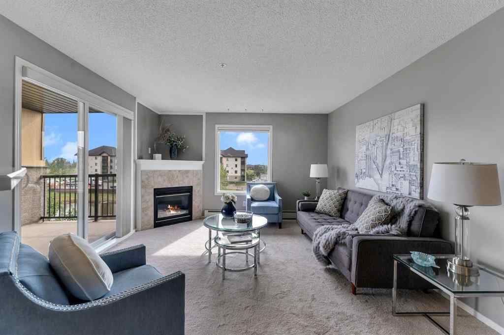 MLS® A2255909 - Unit #8328 304 Mackenzie Way SW in Downtown Airdrie, Residential