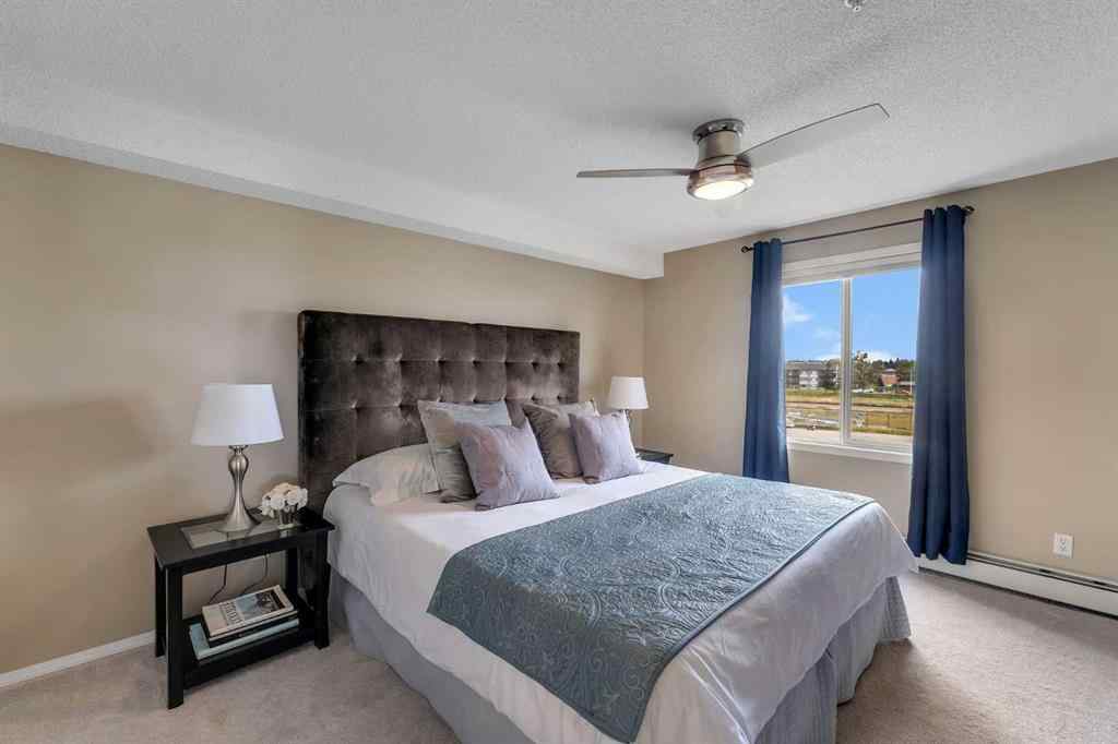 MLS® A2255909 - Unit #8328 304 Mackenzie Way SW in Downtown Airdrie, Residential