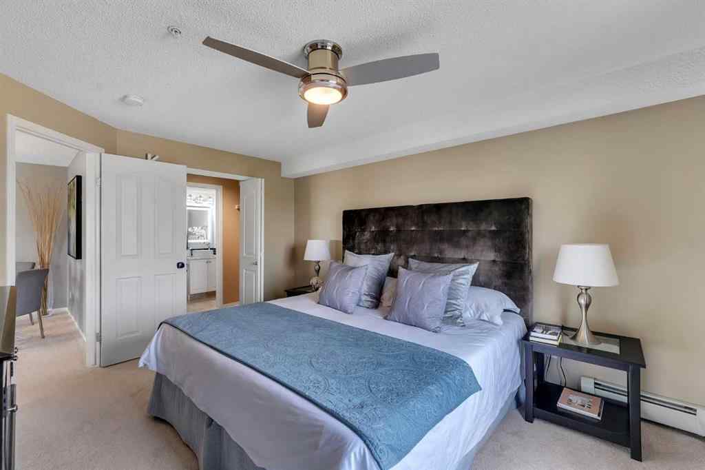 MLS® A2255909 - Unit #8328 304 Mackenzie Way SW in Downtown Airdrie, Residential