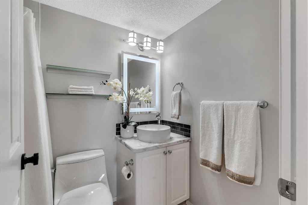 MLS® A2255909 - Unit #8328 304 Mackenzie Way SW in Downtown Airdrie, Residential