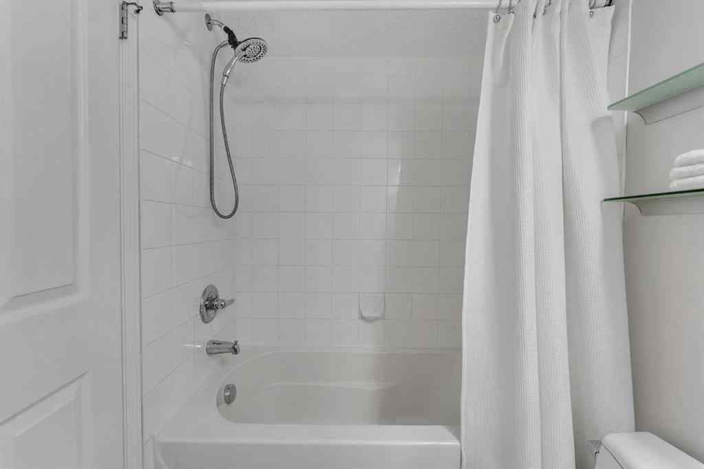 MLS® A2255909 - Unit #8328 304 Mackenzie Way SW in Downtown Airdrie, Residential
