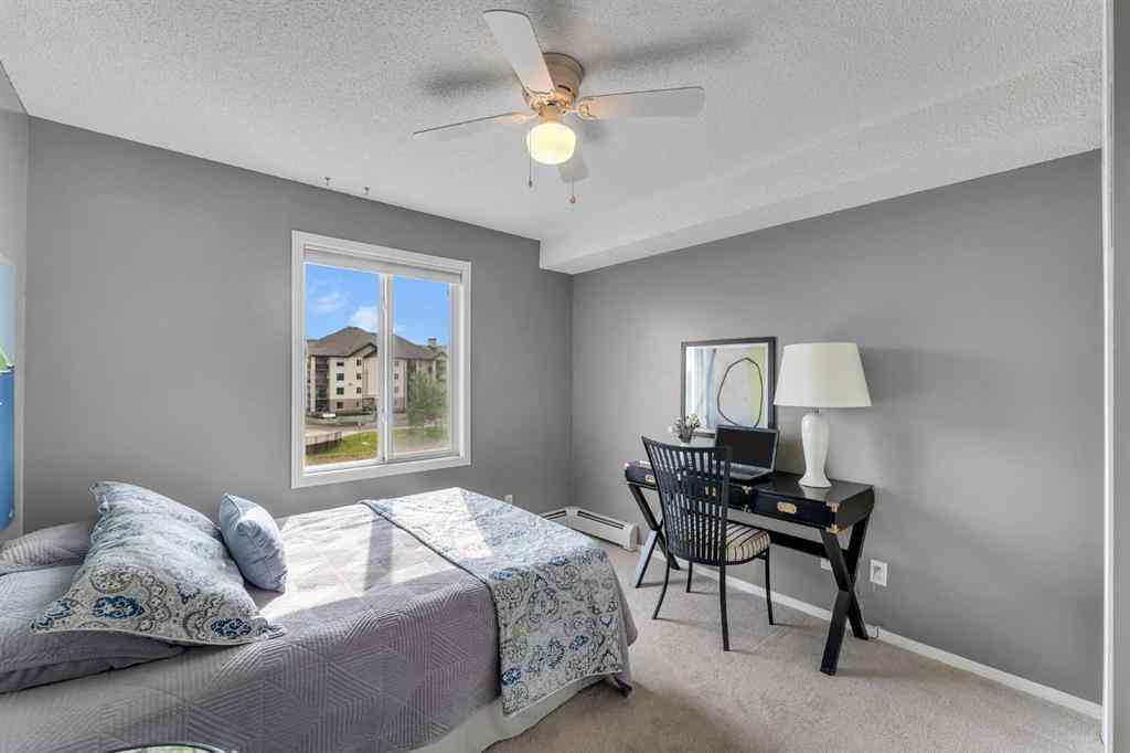 MLS® A2255909 - Unit #8328 304 Mackenzie Way SW in Downtown Airdrie, Residential