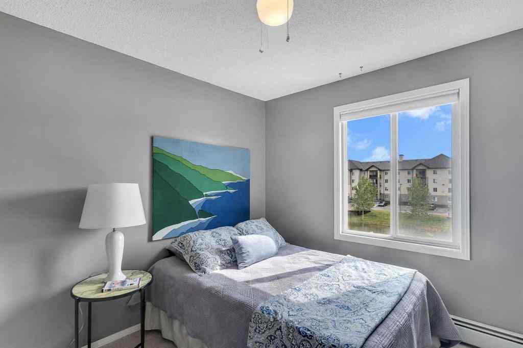 MLS® A2255909 - Unit #8328 304 Mackenzie Way SW in Downtown Airdrie, Residential