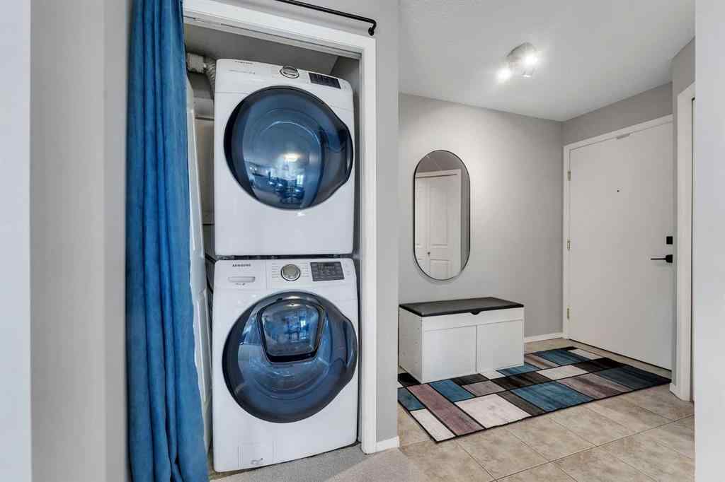 MLS® A2255909 - Unit #8328 304 Mackenzie Way SW in Downtown Airdrie, Residential