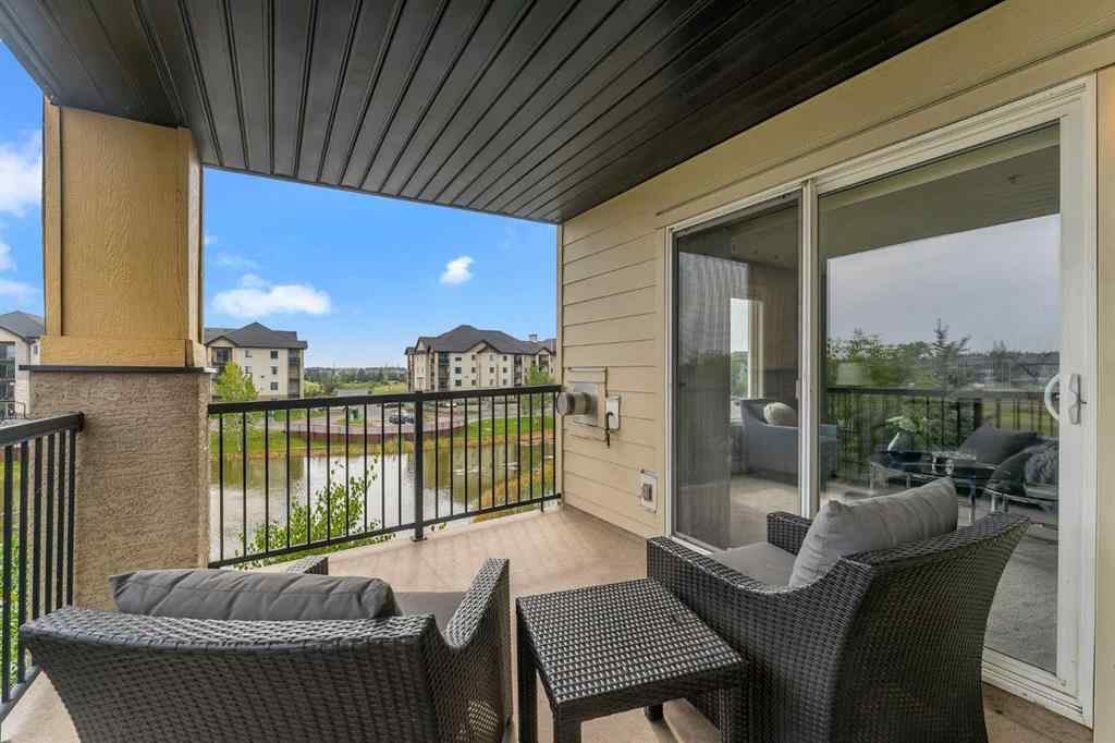 MLS® A2255909 - Unit #8328 304 Mackenzie Way SW in Downtown Airdrie, Residential