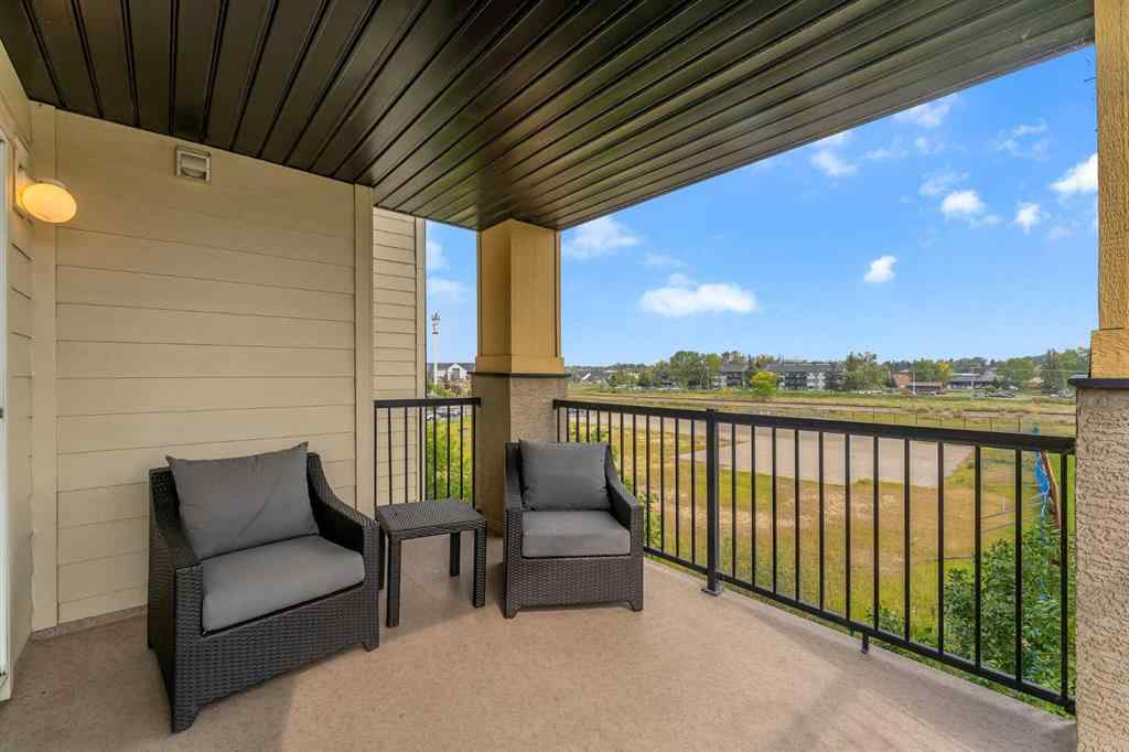 MLS® A2255909 - Unit #8328 304 Mackenzie Way SW in Downtown Airdrie, Residential