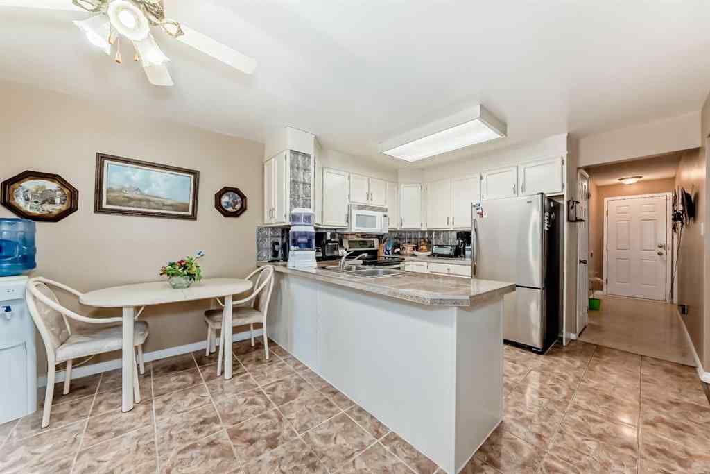 MLS® A2255928 - 983 Woodbine Boulevard SW in Woodbine Calgary, Residential