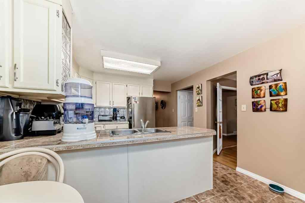 MLS® A2255928 - 983 Woodbine Boulevard SW in Woodbine Calgary, Residential