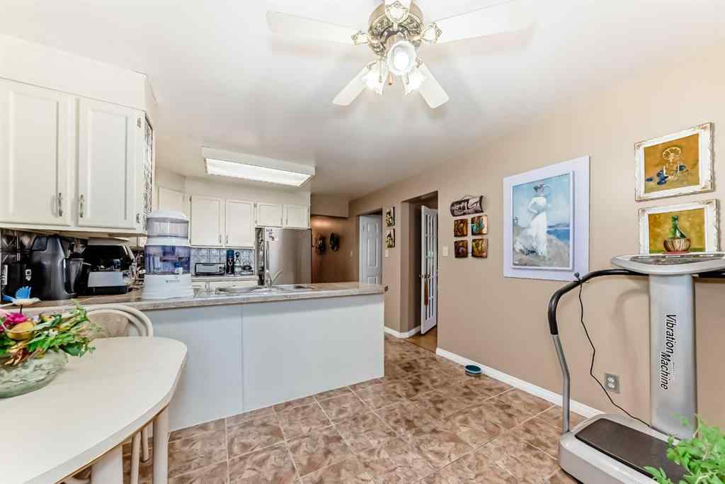 MLS® A2255928 - 983 Woodbine Boulevard SW in Woodbine Calgary, Residential