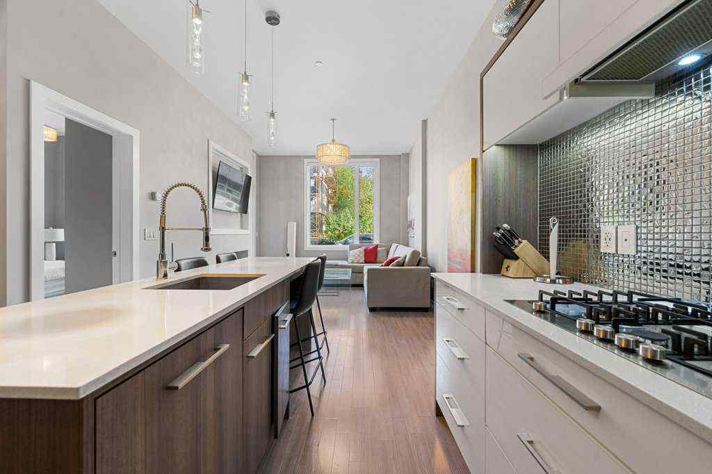 MLS® A2255929 - Unit #105 119 19 Street NW in West Hillhurst Calgary, Residential