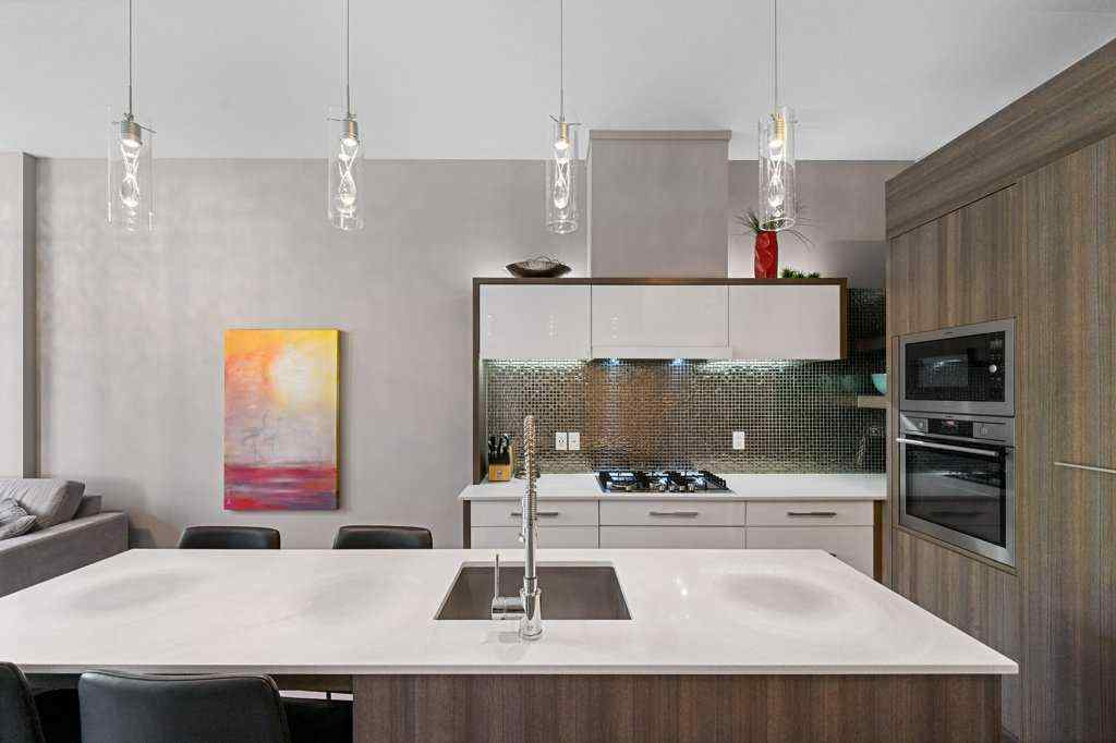 MLS® A2255929 - Unit #105 119 19 Street NW in West Hillhurst Calgary, Residential