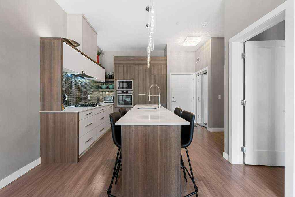 MLS® A2255929 - Unit #105 119 19 Street NW in West Hillhurst Calgary, Residential