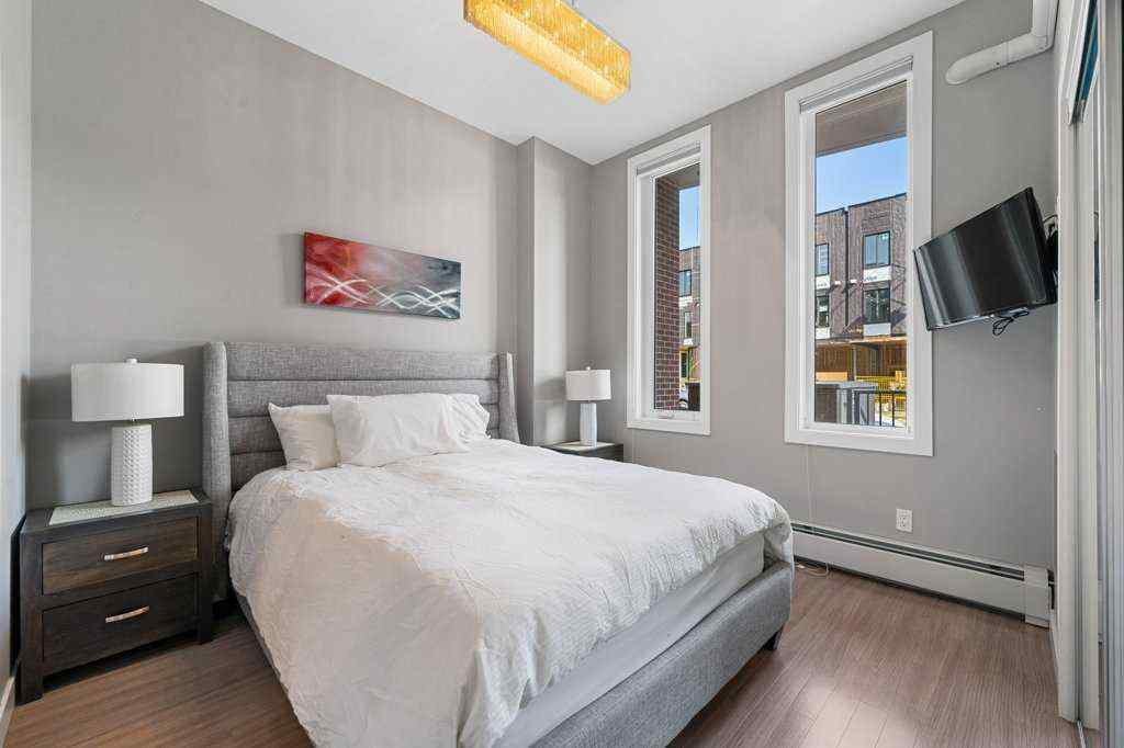 MLS® A2255929 - Unit #105 119 19 Street NW in West Hillhurst Calgary, Residential