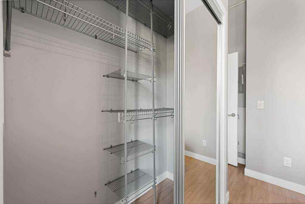 MLS® A2255929 - Unit #105 119 19 Street NW in West Hillhurst Calgary, Residential