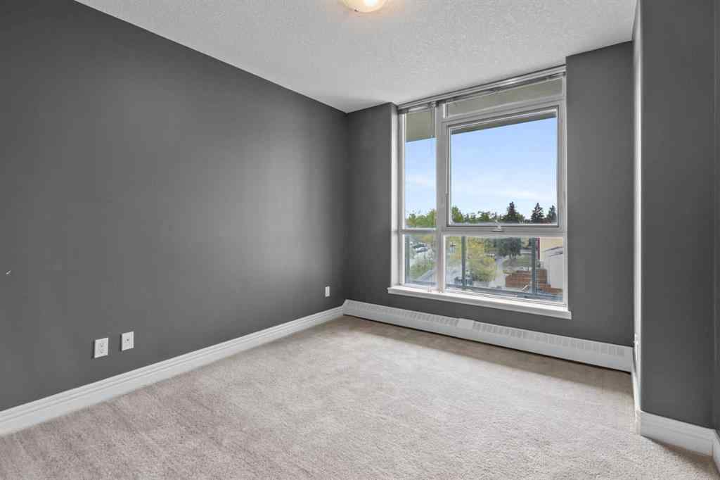 MLS® A2255941 - Unit #407 55 Spruce Place SW in Spruce Cliff Calgary, Residential
