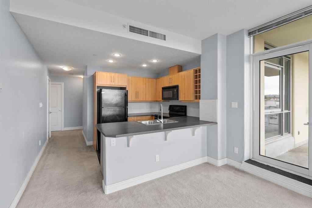 MLS® A2255941 - Unit #407 55 Spruce Place SW in Spruce Cliff Calgary, Residential