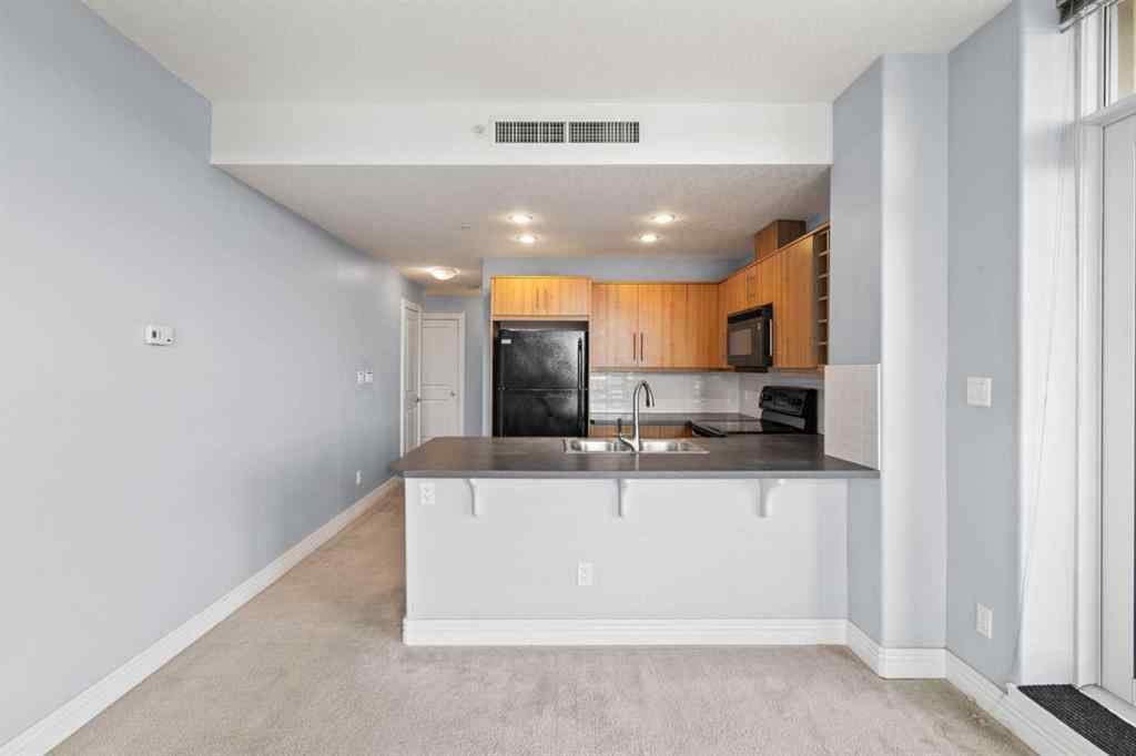 MLS® A2255941 - Unit #407 55 Spruce Place SW in Spruce Cliff Calgary, Residential