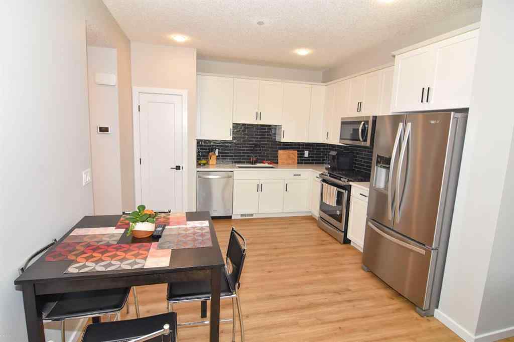 MLS® A2255944 - Unit #3 71 Lucas Street NW in Livingston Calgary, Residential