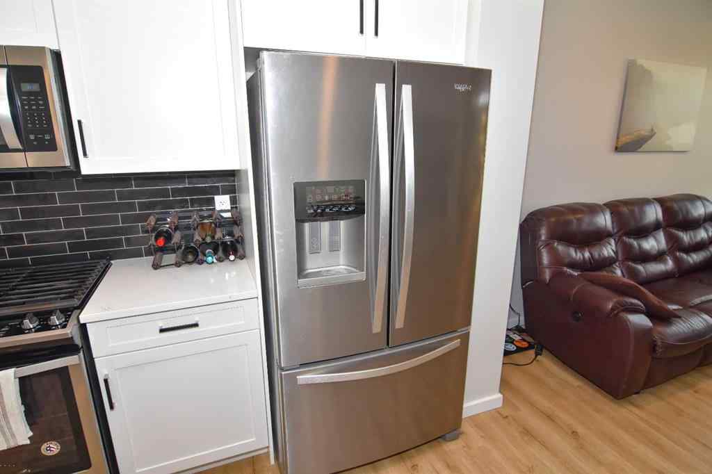 MLS® A2255944 - Unit #3 71 Lucas Street NW in Livingston Calgary, Residential