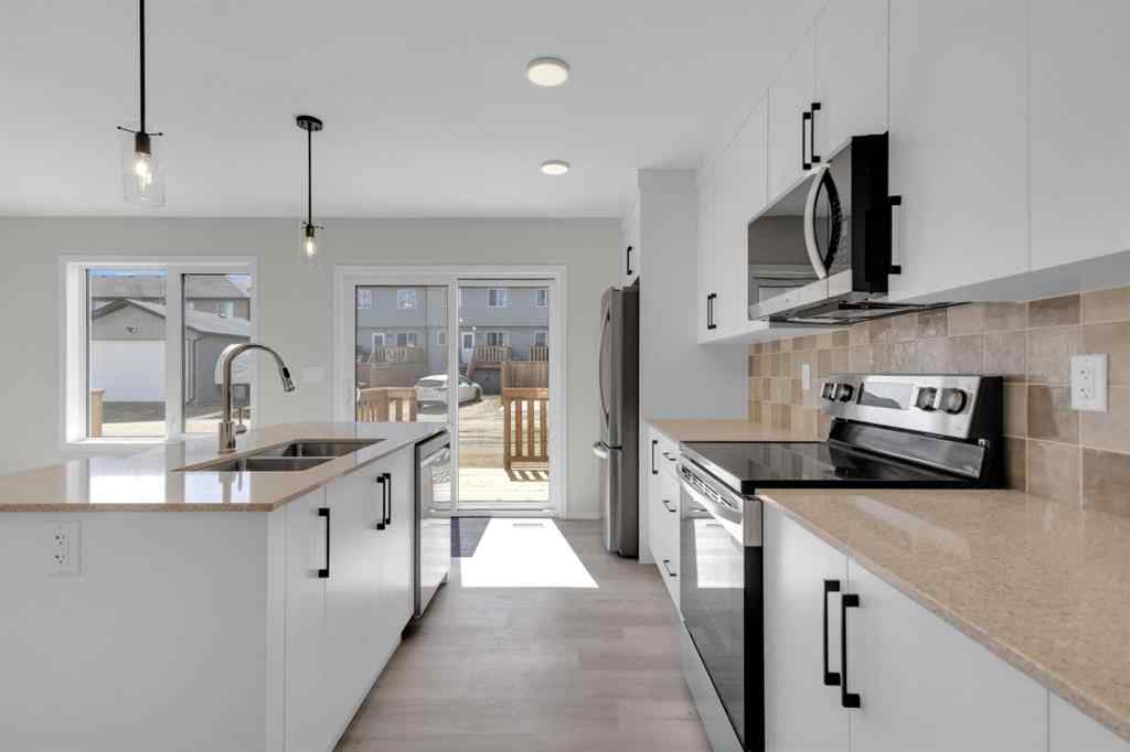 MLS® A2255950 - 54 Anna Close  in Aspen Lakes West Blackfalds, Residential