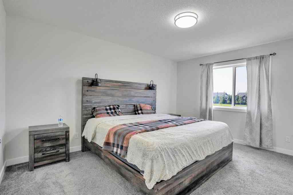 MLS® A2255958 - 15 Midgrove Drive SW in Midtown Airdrie, Residential