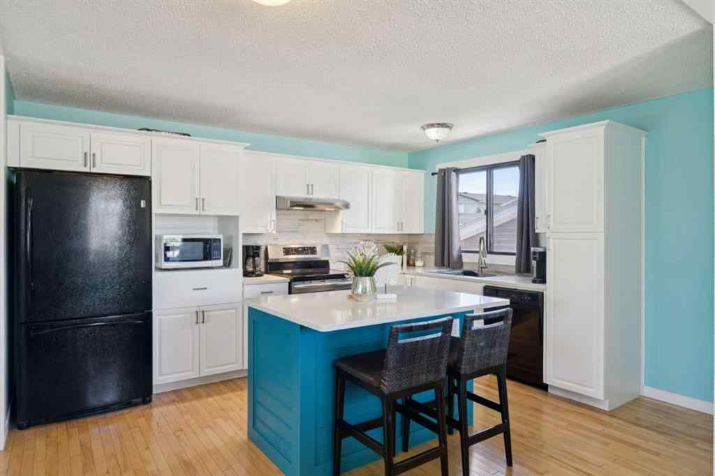 MLS® A2256005 - 14 Glenhill Crescent  in Glenbow Cochrane, Residential