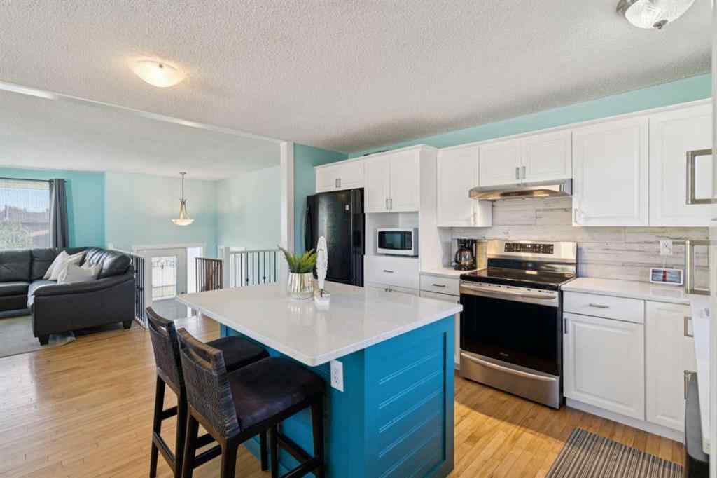 MLS® A2256005 - 14 Glenhill Crescent  in Glenbow Cochrane, Residential