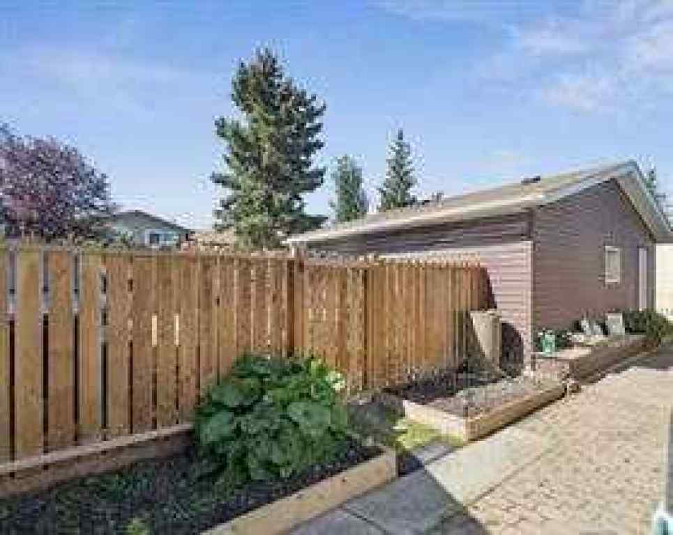 MLS® A2256005 - 14 Glenhill Crescent  in Glenbow Cochrane, Residential