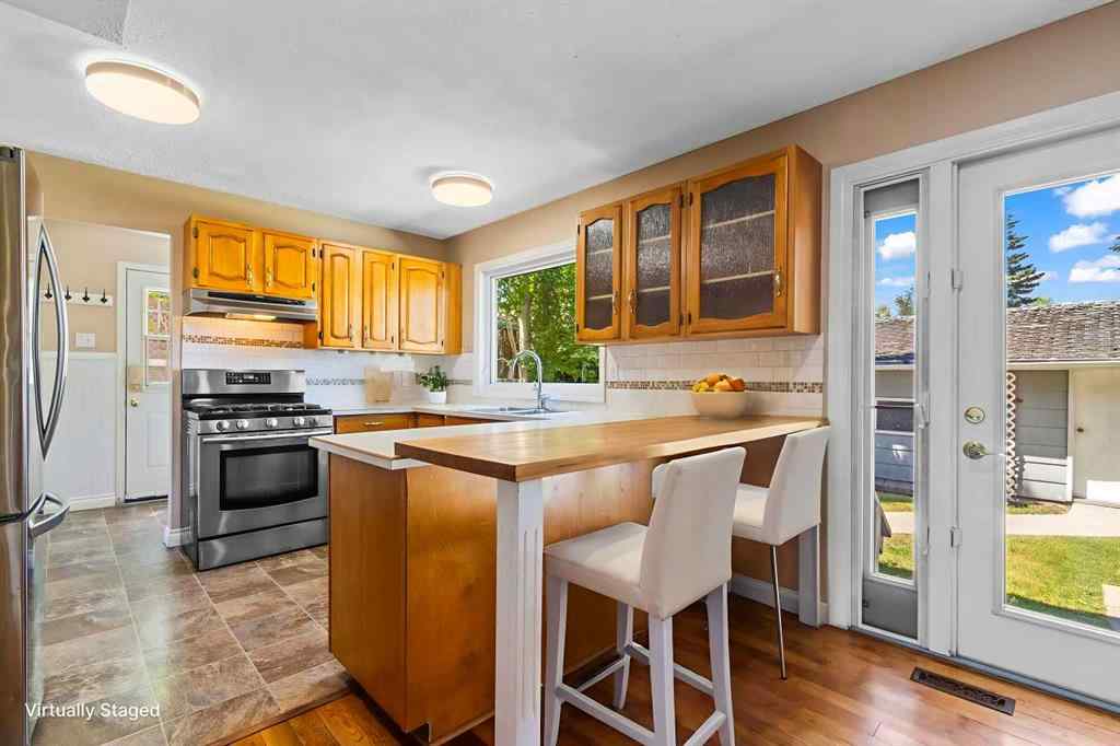 MLS® A2256008 - 320 Parkridge Way SE in Parkland Calgary, Residential