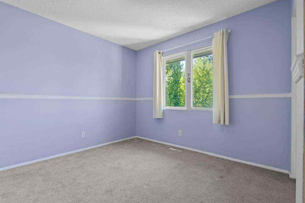 MLS® A2256008 - 320 Parkridge Way SE in Parkland Calgary, Residential