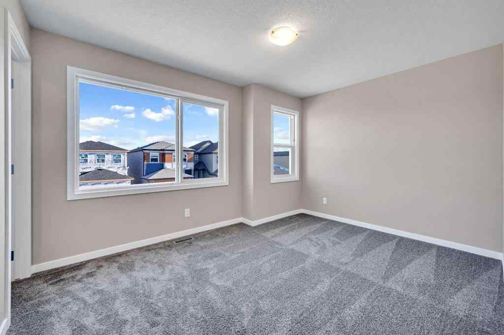 MLS® A2256013 - 152 Wolf Hollow Manor SE in Wolf Willow Calgary, Residential