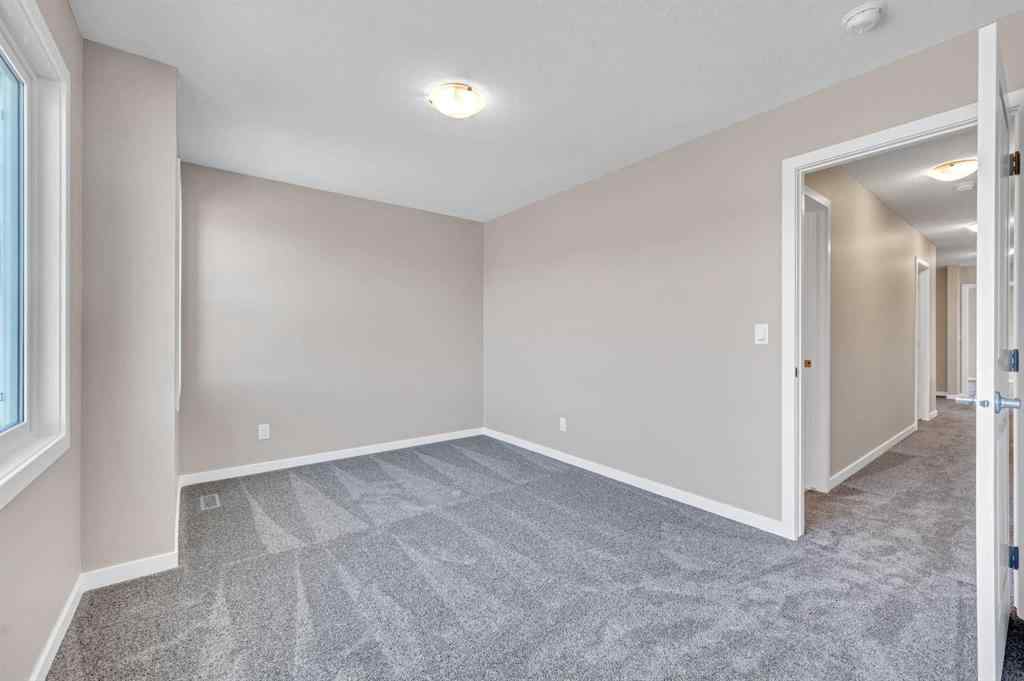 MLS® A2256013 - 152 Wolf Hollow Manor SE in Wolf Willow Calgary, Residential