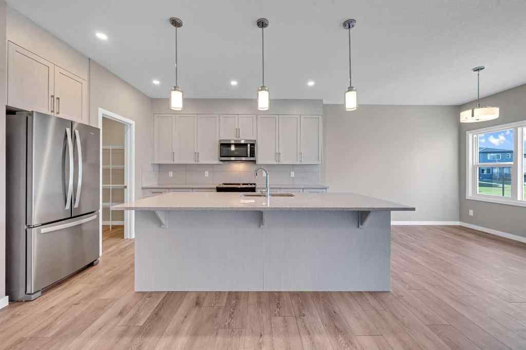 MLS® A2256013 - 152 Wolf Hollow Manor SE in Wolf Willow Calgary, Residential