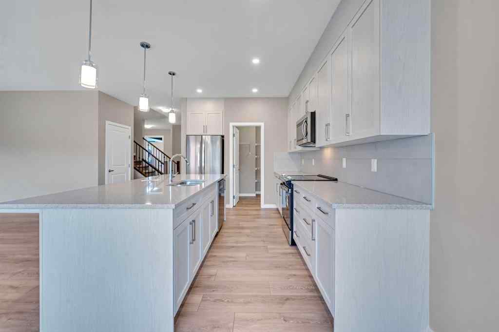 MLS® A2256013 - 152 Wolf Hollow Manor SE in Wolf Willow Calgary, Residential