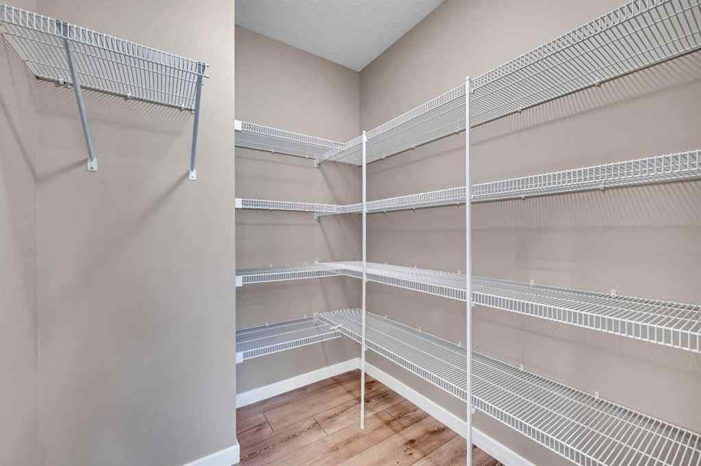MLS® A2256013 - 152 Wolf Hollow Manor SE in Wolf Willow Calgary, Residential