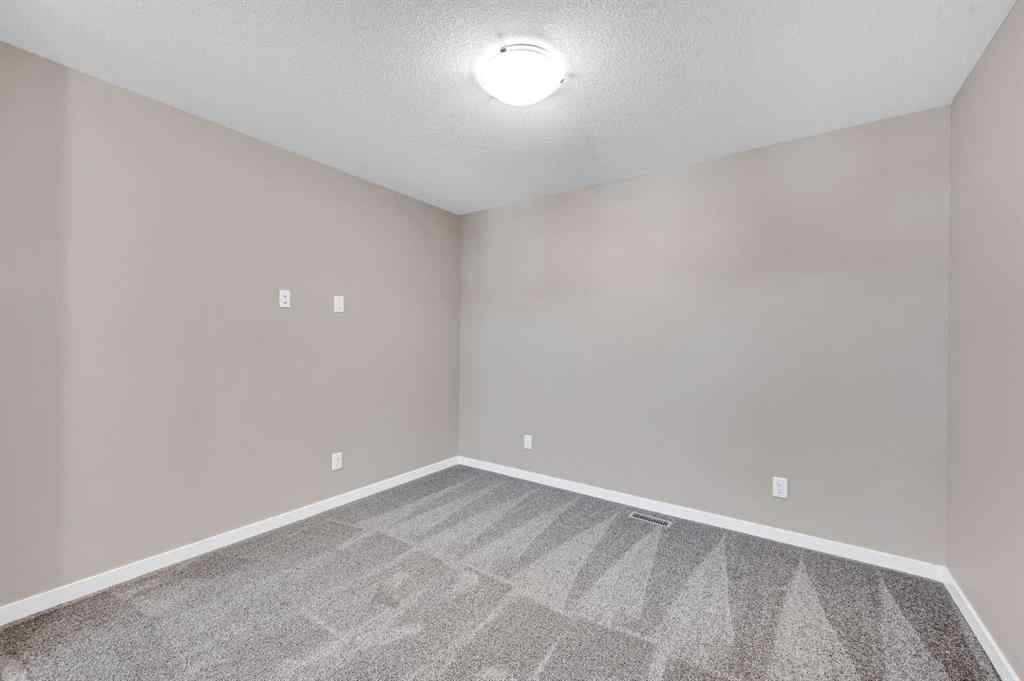 MLS® A2256013 - 152 Wolf Hollow Manor SE in Wolf Willow Calgary, Residential