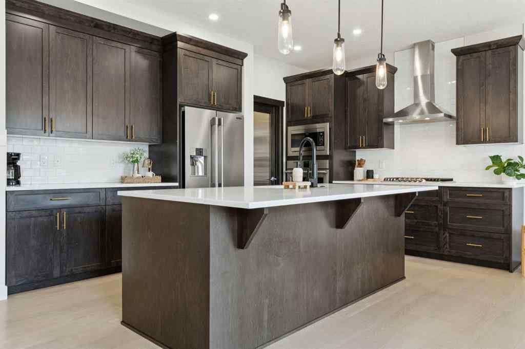 MLS® A2256023 - 206 Riviera View  in Riviera Cochrane, Residential