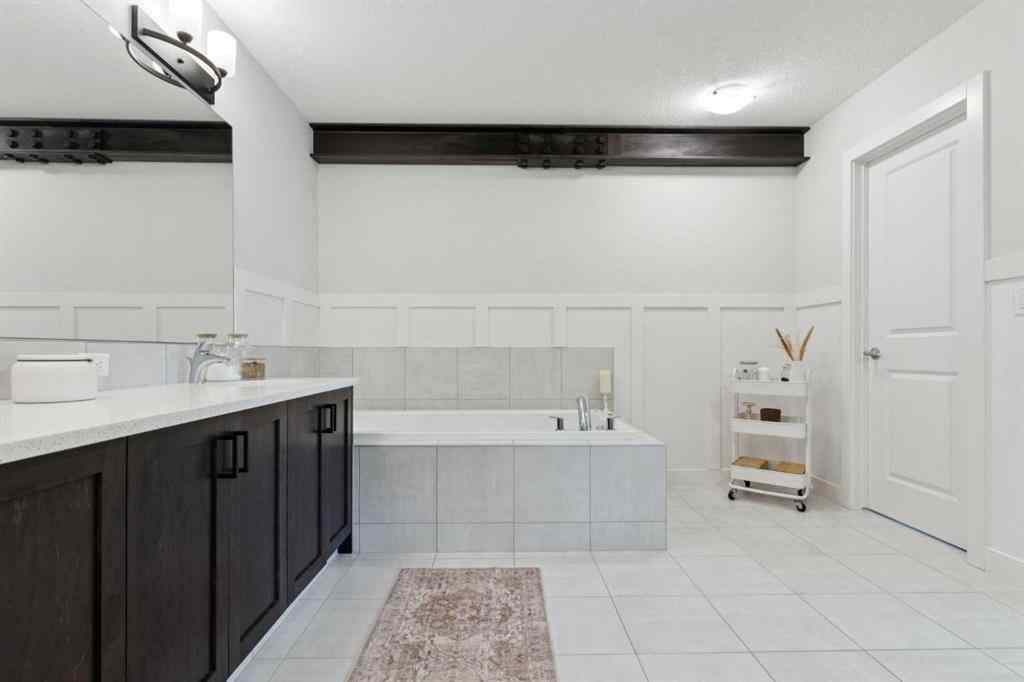 MLS® A2256023 - 206 Riviera View  in Riviera Cochrane, Residential