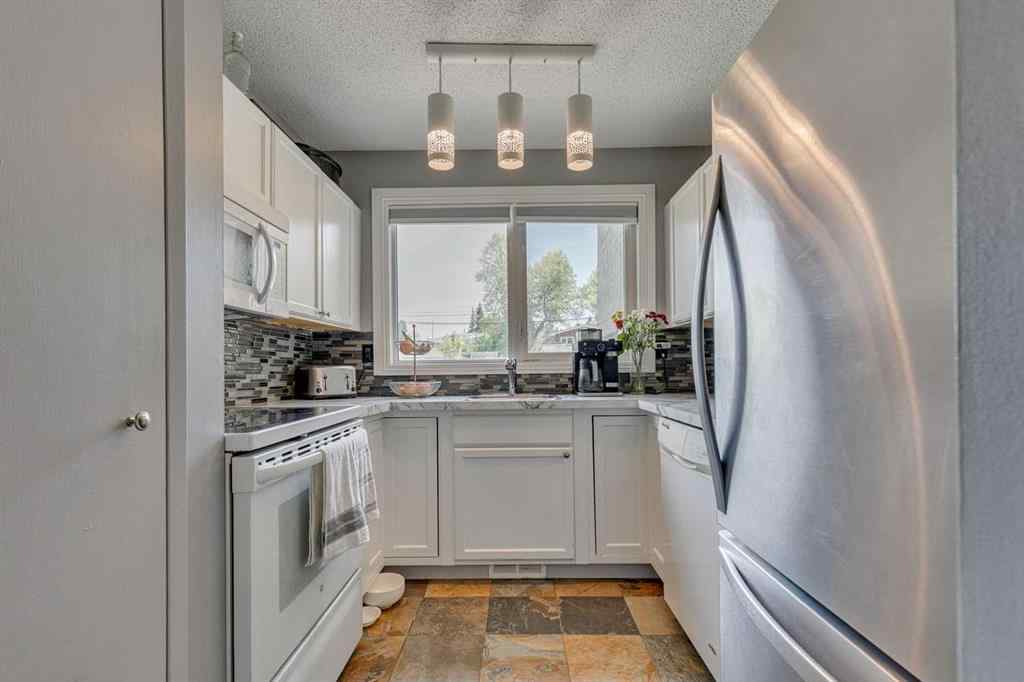 MLS® A2256026 - Unit #12 6440 4 Street NW in Thorncliffe Calgary, Residential