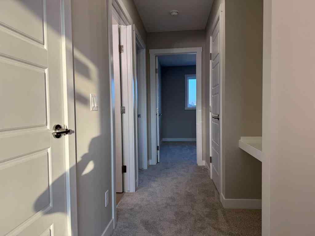 MLS® A2256036 - 302 Sundown Road  in Sunset Ridge Cochrane, Residential
