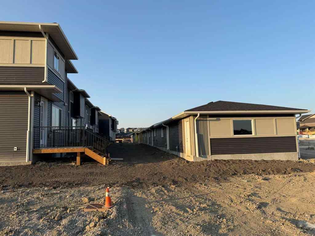 MLS® A2256036 - 302 Sundown Road  in Sunset Ridge Cochrane, Residential