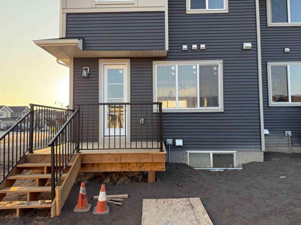 MLS® A2256036 - 302 Sundown Road  in Sunset Ridge Cochrane, Residential