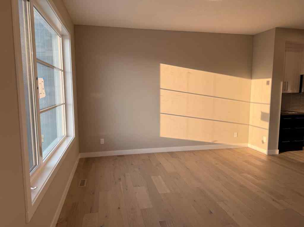 MLS® A2256036 - 302 Sundown Road  in Sunset Ridge Cochrane, Residential