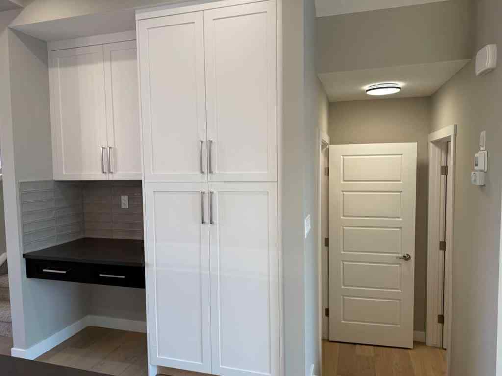 MLS® A2256036 - 302 Sundown Road  in Sunset Ridge Cochrane, Residential